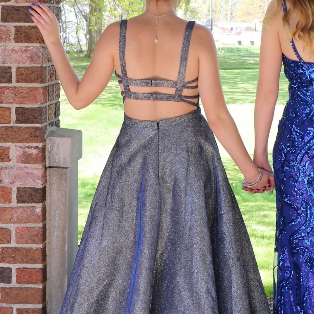 Beautiful Sherri Hill Dress,Silver Material Shimmers Blue and Purple.  Size 6